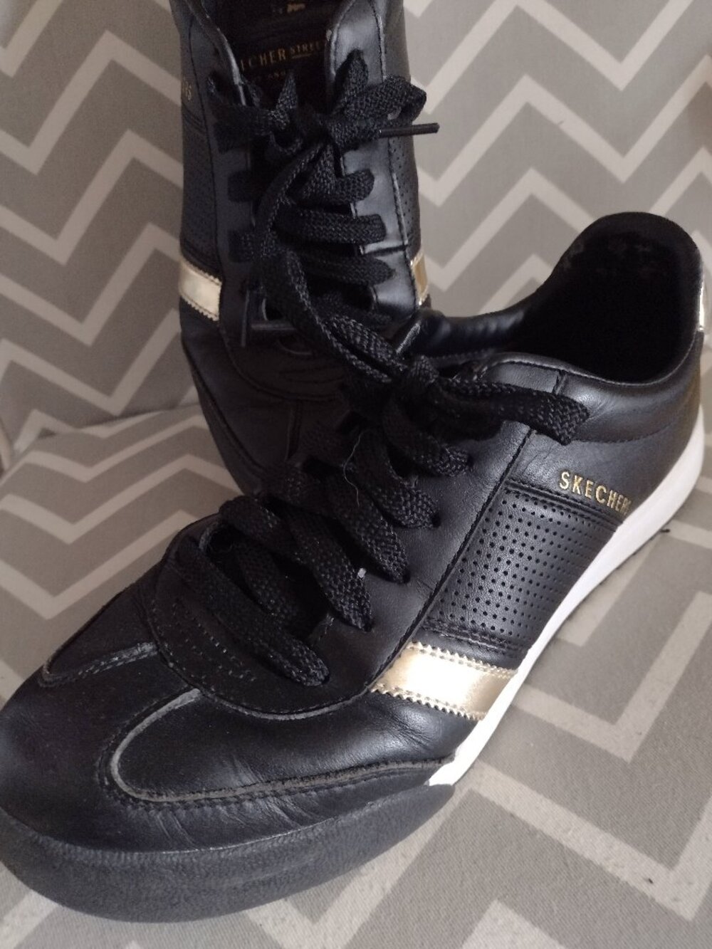 Sketchers Street Black and Gold Sneakers